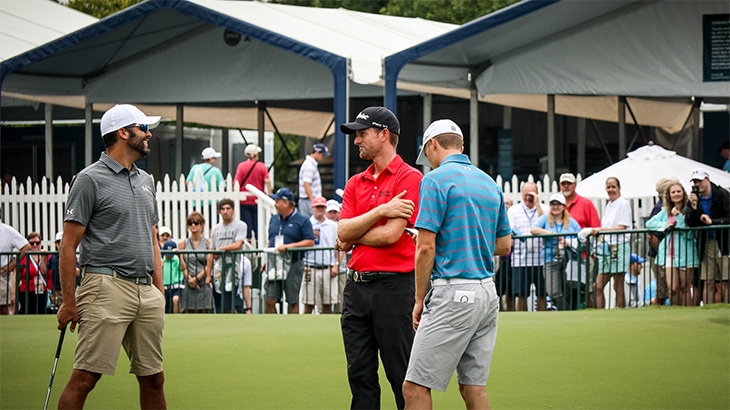 After his round, Simpson stops to congratulate...